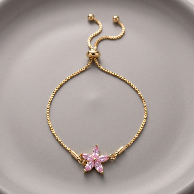Gold Renkli Pembe Taşlı Çiçek Figürlü Asansörlü Bileklik