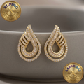 Zirkon ve Baget Taşlı Altın Kaplama Gold Sarmal Damla Küpe